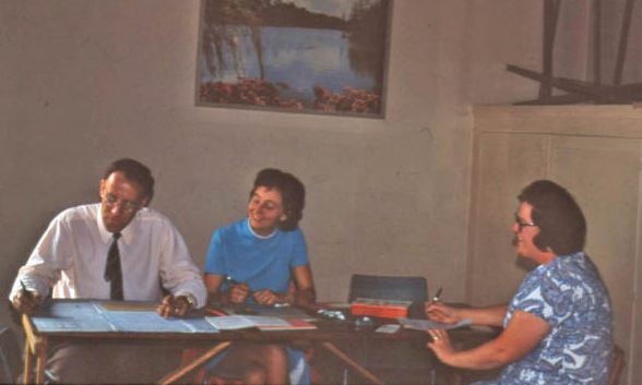 Picture taken in 1974 of Eddie Scholes, our Show Secretary that year working on the score sheet assisted by his wife Barbara, with Joy Burman, Assistant General Secretary looking on.