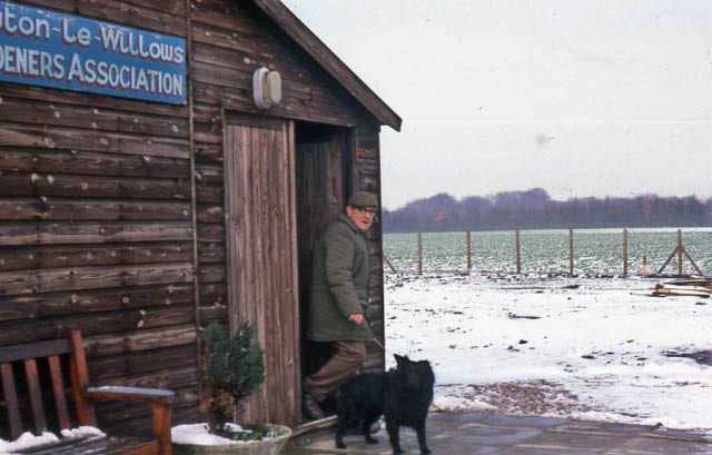 Picture taken in April 1987 - looks like it was a cold one that year! Ernie Watson is seen leaving with his dog. Our older members will remember Ernie giving his impromptu gardening lectures whilst working the till, completely oblivious to the ever-growing queue waiting impatiently to be served!