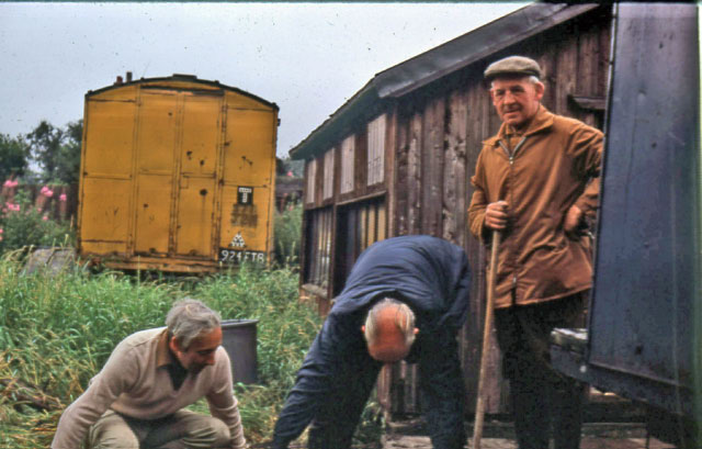 The second (yellow) caravan and second shed (an old hen house donated by Miss Joan Hayes of Redclyffe, Mere Road) From Left to Right - Harry Bottomley, Eddie Poole, and john Townsend)